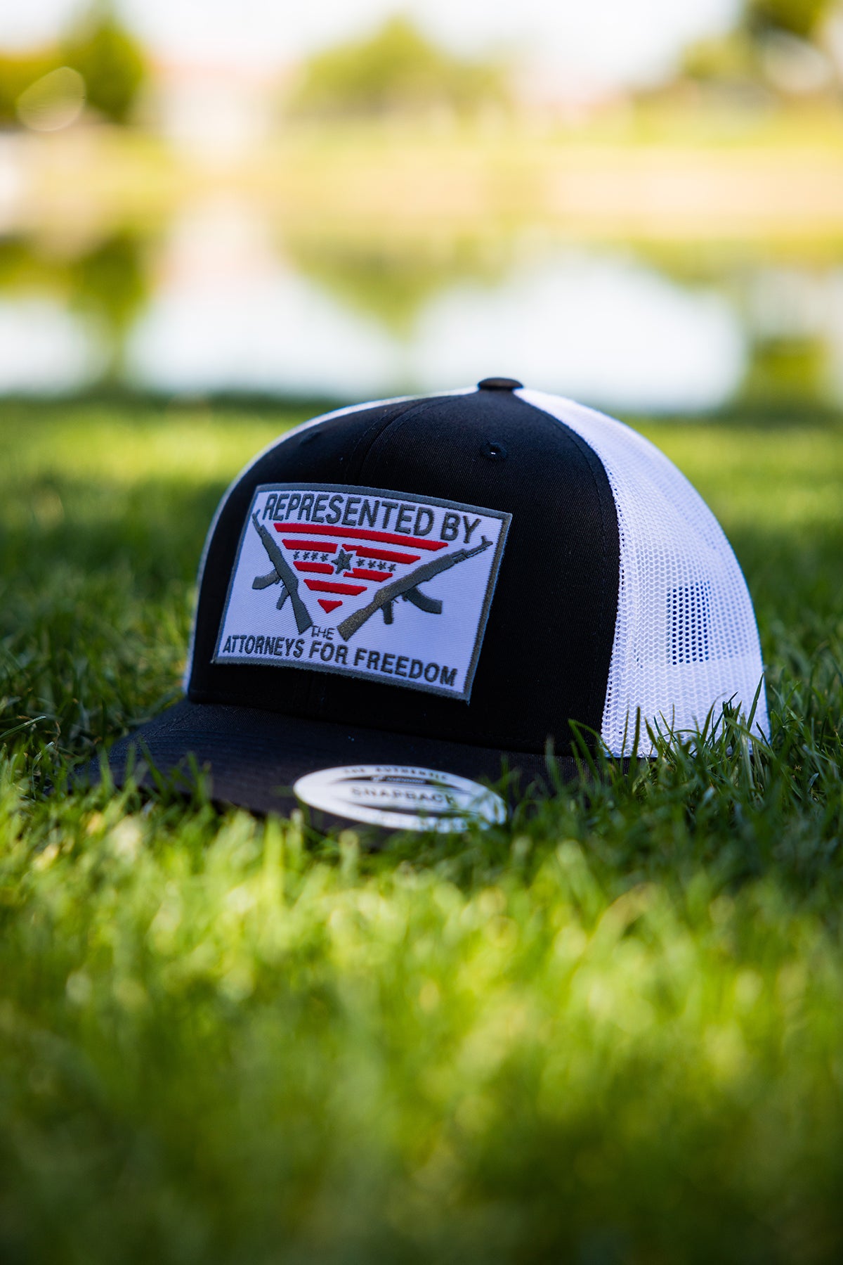 Represented By The Attorneys For Freedom Patch Trucker Hat | Attorneys On Retainer