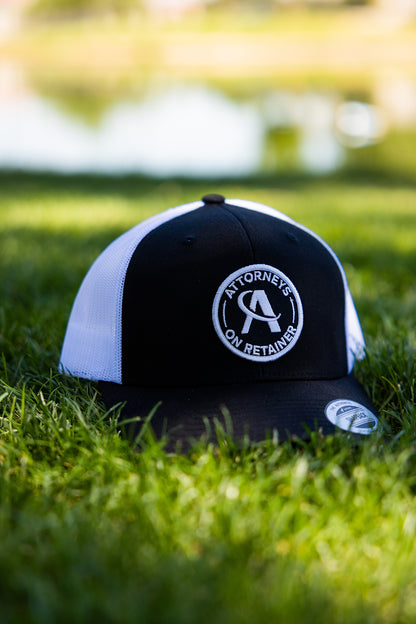 AOR Circle Patch Trucker Hat | Attorneys On Retainer